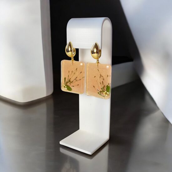 Gaiši auskari ar ziediem